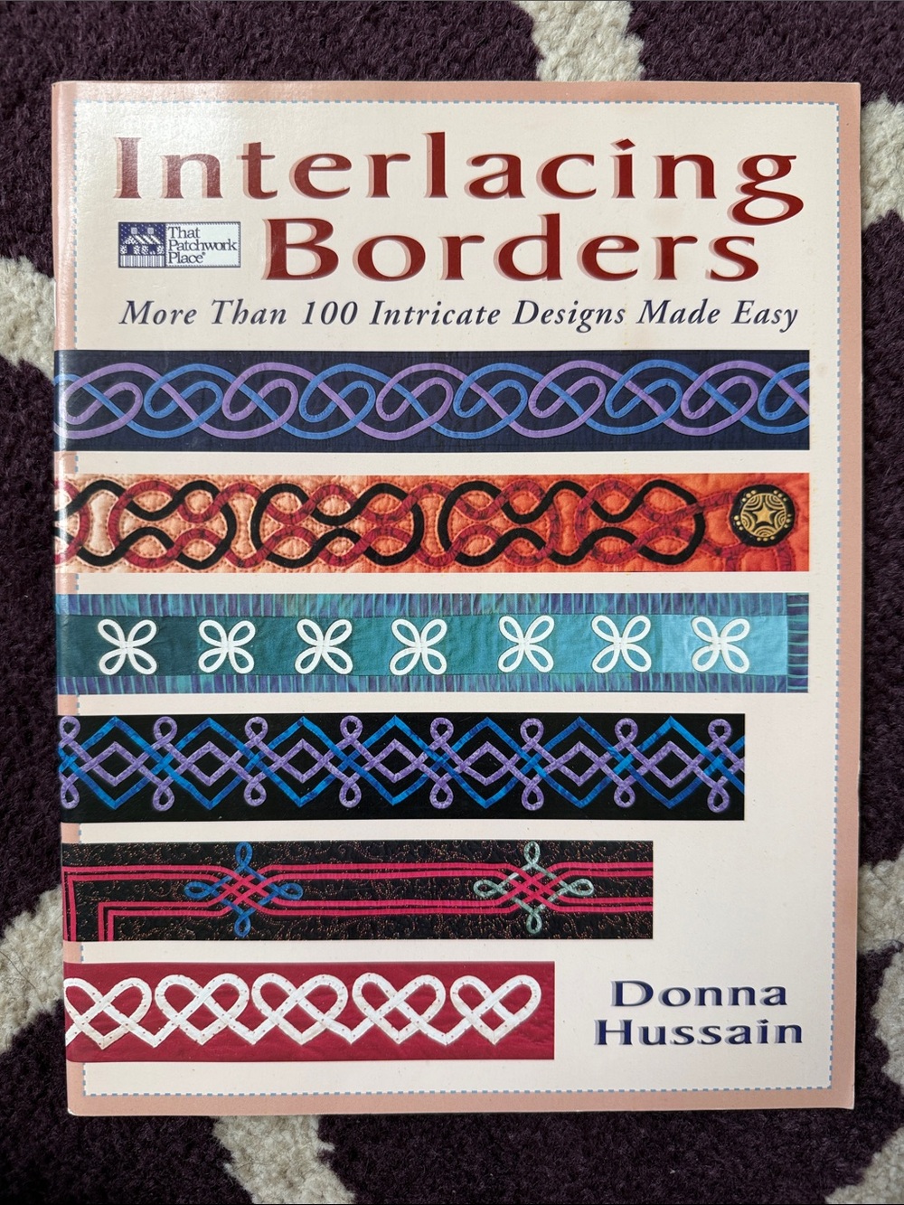 Interlacing Borders Book - White/Cream Cover